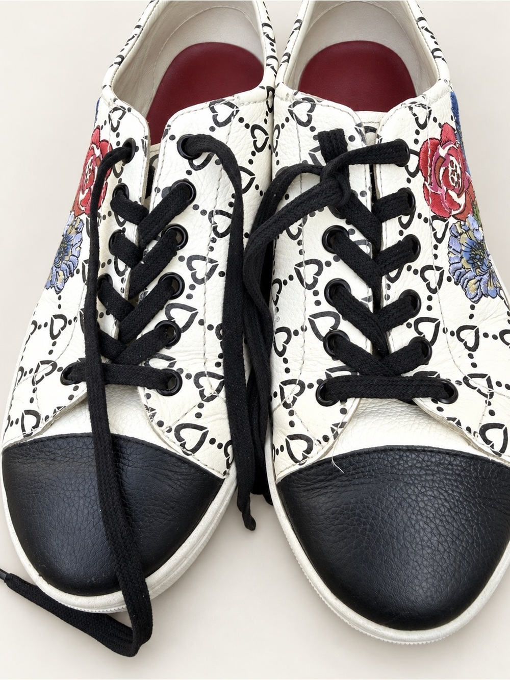 Brighton White Floral Embroidered Sneakers with Red, Blue and Green Accents